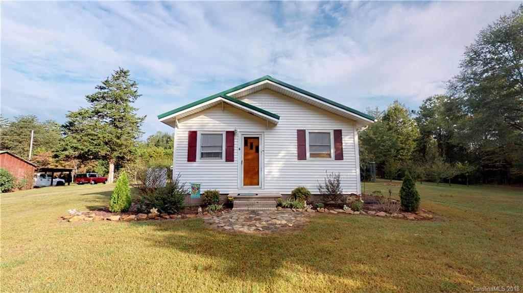 5812 Gilbert Hilton Road Vale, NC 28168 - Photo 1 of 35 a view of a house with backyard and sitting area
