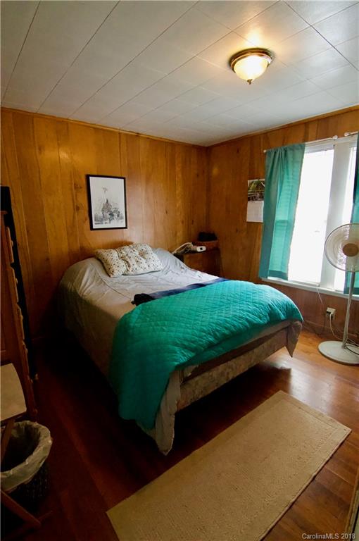 5812 Gilbert Hilton Road Vale, NC 28168 - Photo 11 of 35 a bed sitting in a bedroom next to a window