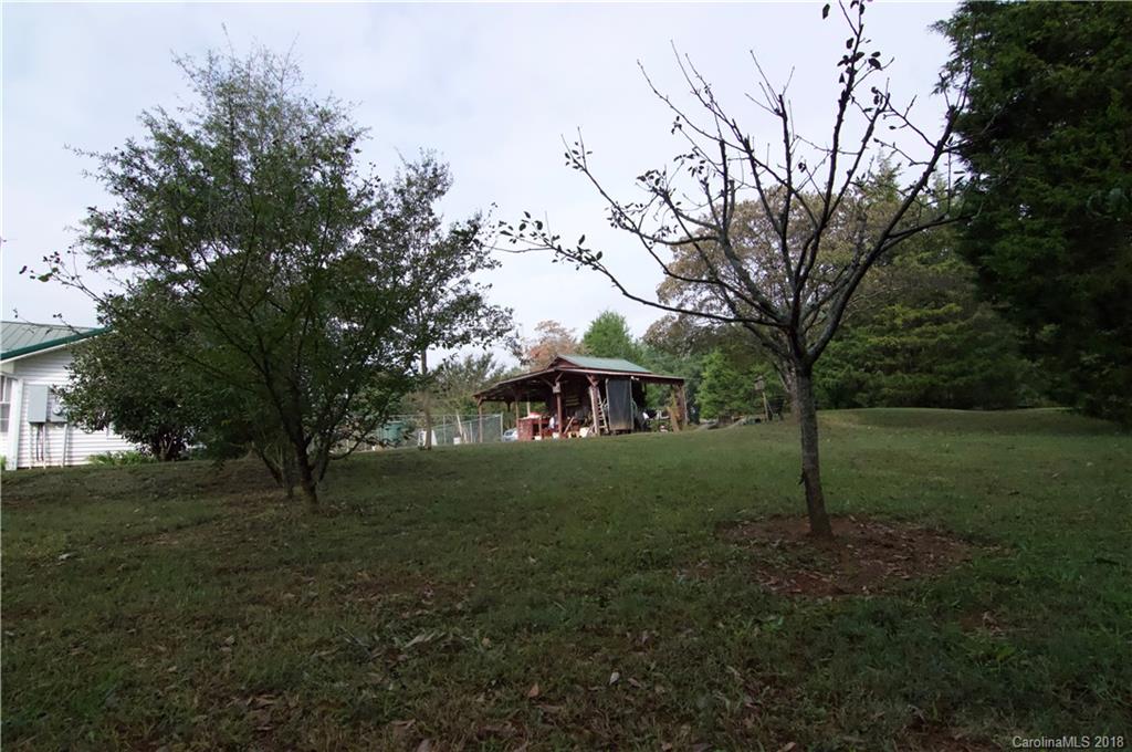 5812 Gilbert Hilton Road Vale, NC 28168 - Photo 28 of 35 a view of a big yard with large trees