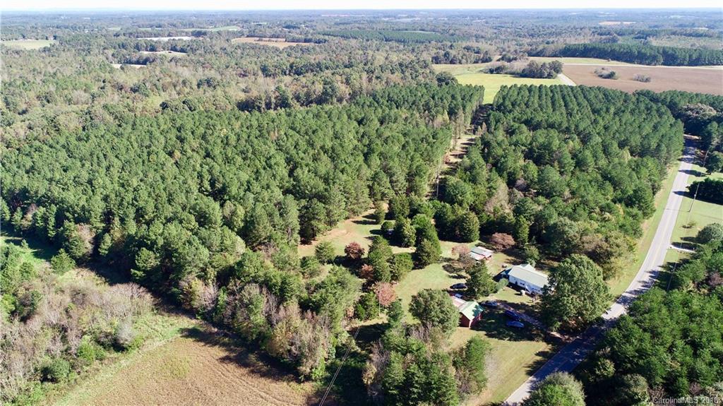 5812 Gilbert Hilton Road Vale, NC 28168 - Photo 31 of 35 an aerial view of a forest with houses
