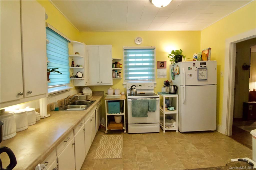 5812 Gilbert Hilton Road Vale, NC 28168 - Photo 7 of 35 a kitchen with a sink appliances and cabinets