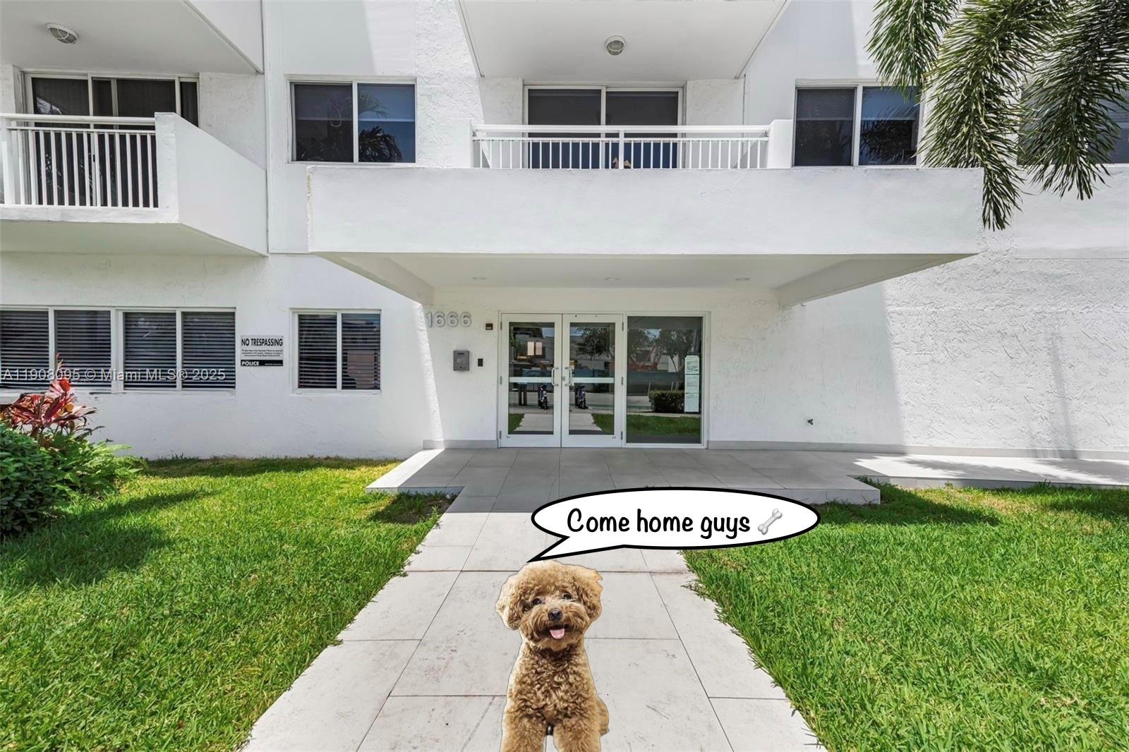 1665 Bay Road, Unit 221 Miami Beach, FL 33139 - Photo 28 of 32 a view of swimming pool with a garden and plants
