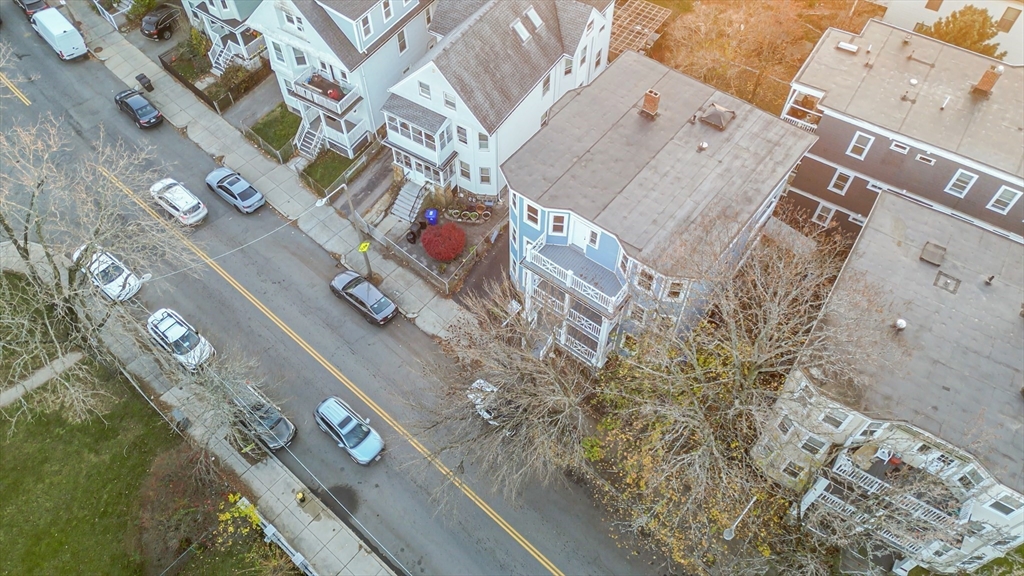 381 Adams Street, Unit 3 Boston, MA 02122 - Photo 35 of 41 a city view with tall buildings