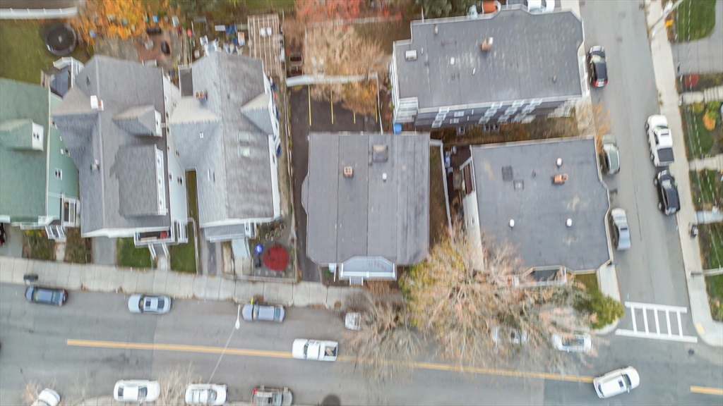 381 Adams Street, Unit 3 Boston, MA 02122 - Photo 38 of 41 an aerial view of residential houses with outdoor space and street view