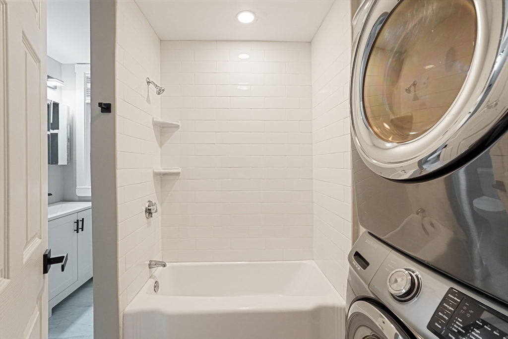 381 Adams Street, Unit 3 Boston, MA 02122 - Photo 8 of 41 a bathroom with a sink a toilet and a bathtub