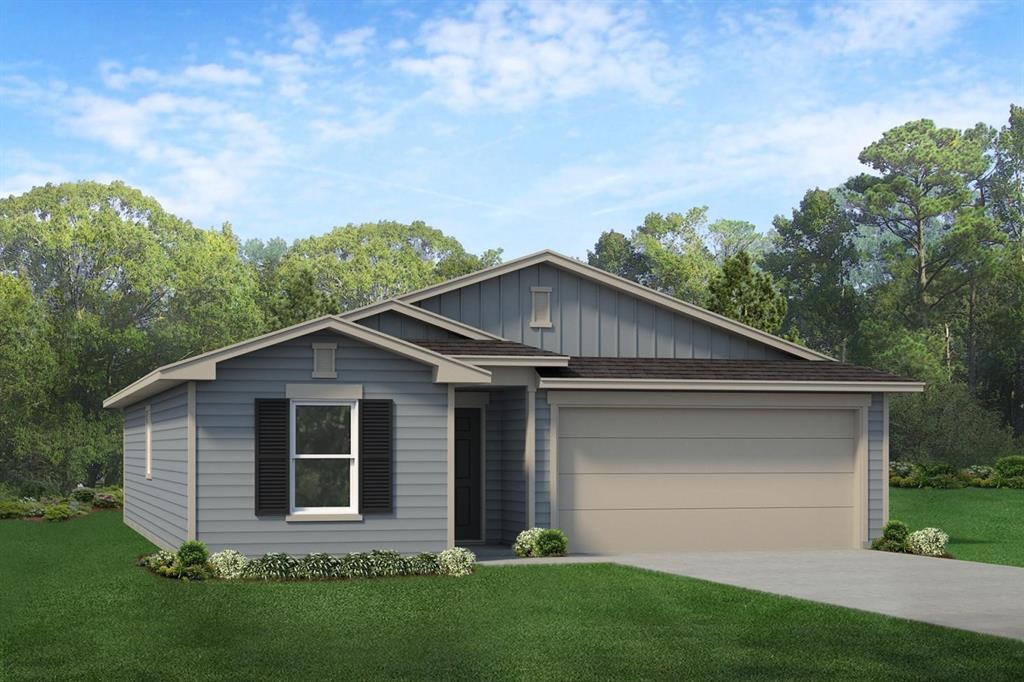 a view of a yard in front of a house with plants and large tree