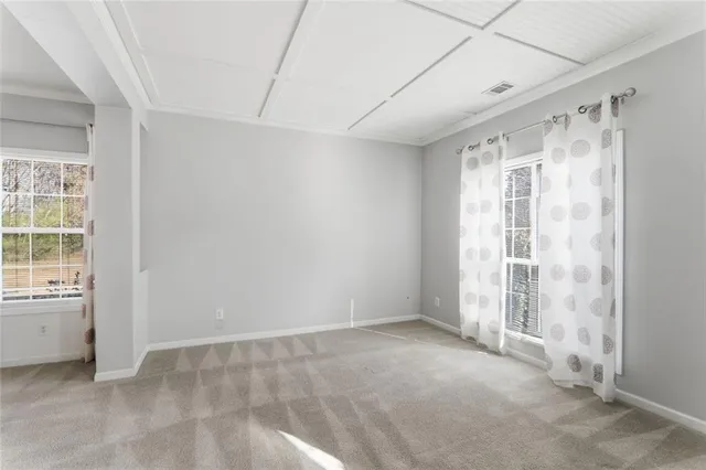 an empty room with windows