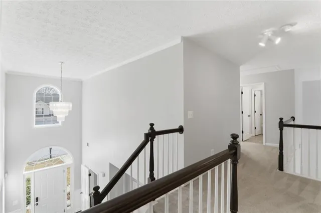 a view of a hallway with front door