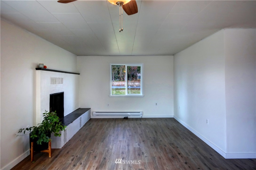28 Fiker Road Omak, WA 98841 - Photo 3 of 39 wooden floor in an empty room