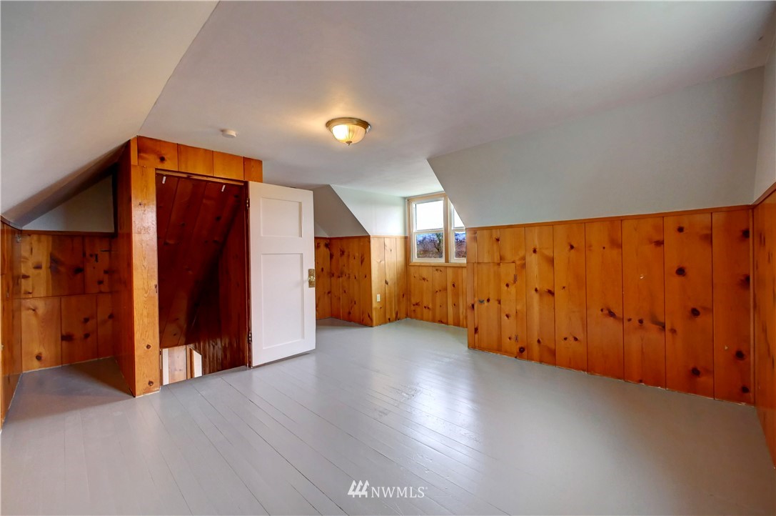 28 Fiker Road Omak, WA 98841 - Photo 24 of 39 an empty room with wooden floor and closet