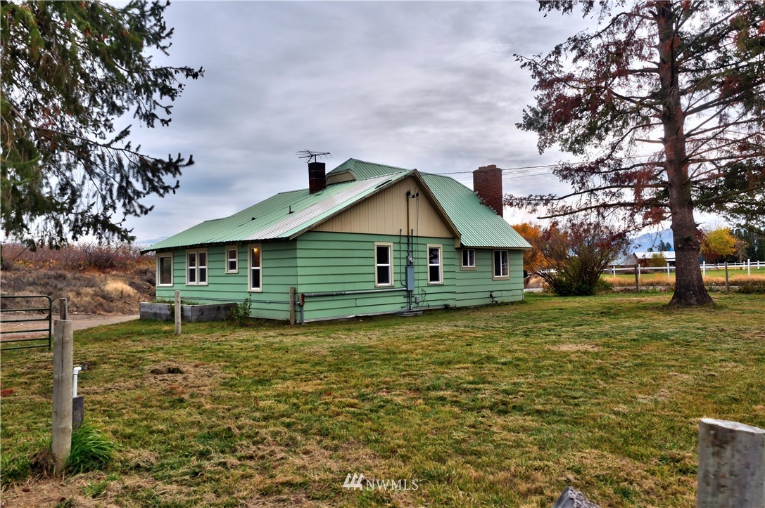 28 Fiker Road Omak, WA 98841 - Photo 36 of 39 a view of a house with a yard