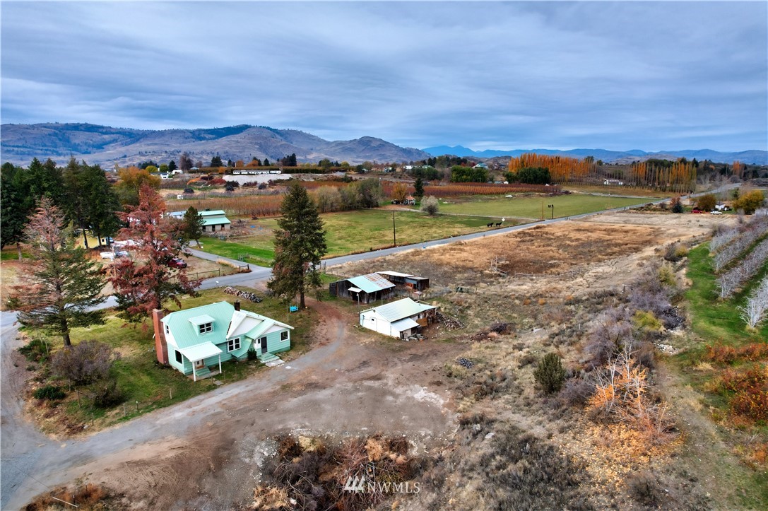 28 Fiker Road Omak, WA 98841 - Photo 38 of 39 an aerial view of a residential houses with outdoor space and street view