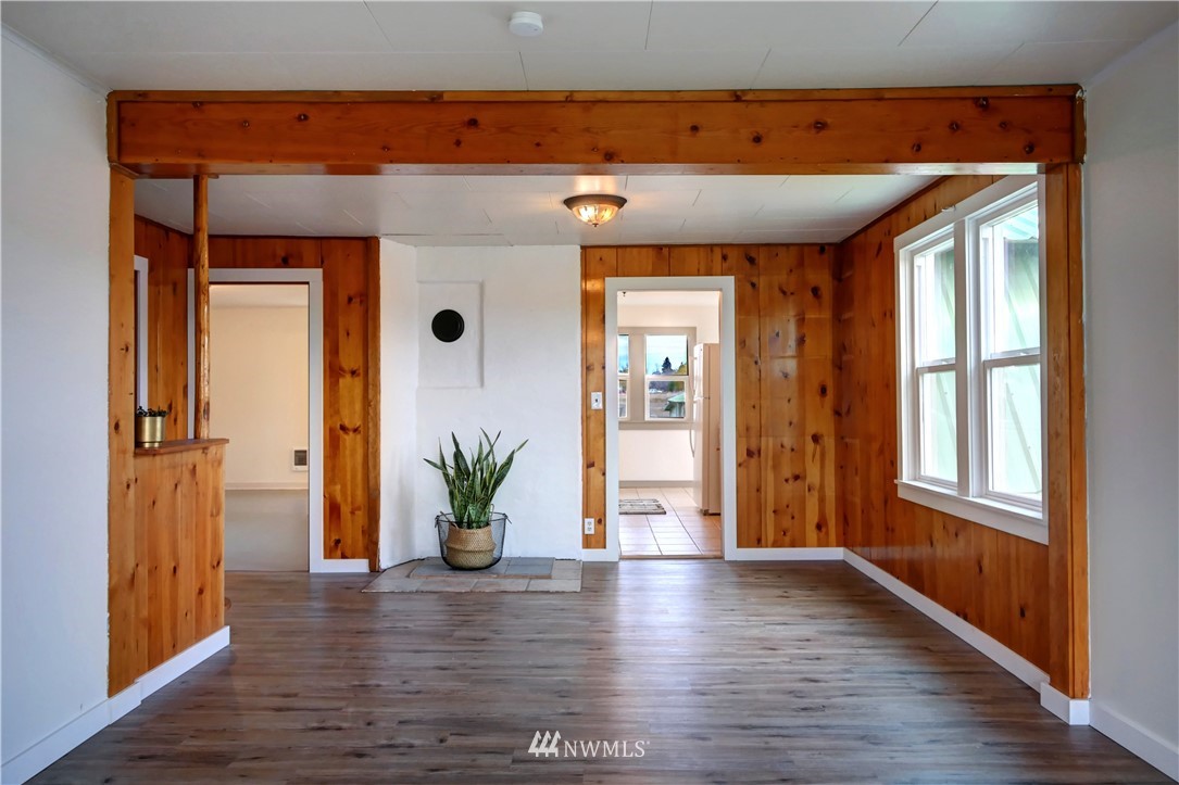 28 Fiker Road Omak, WA 98841 - Photo 6 of 39 wooden floor in an empty room with a window