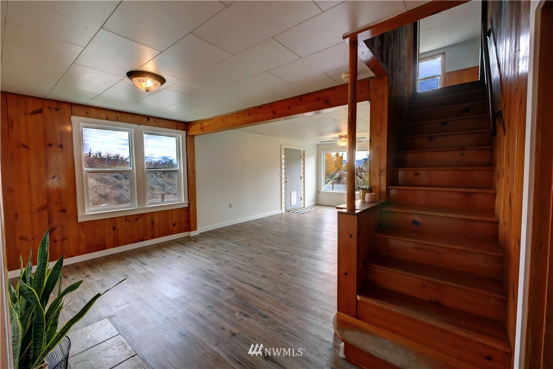 28 Fiker Road Omak, WA 98841 - Photo 10 of 39 a view of an entryway with wooden floor and door