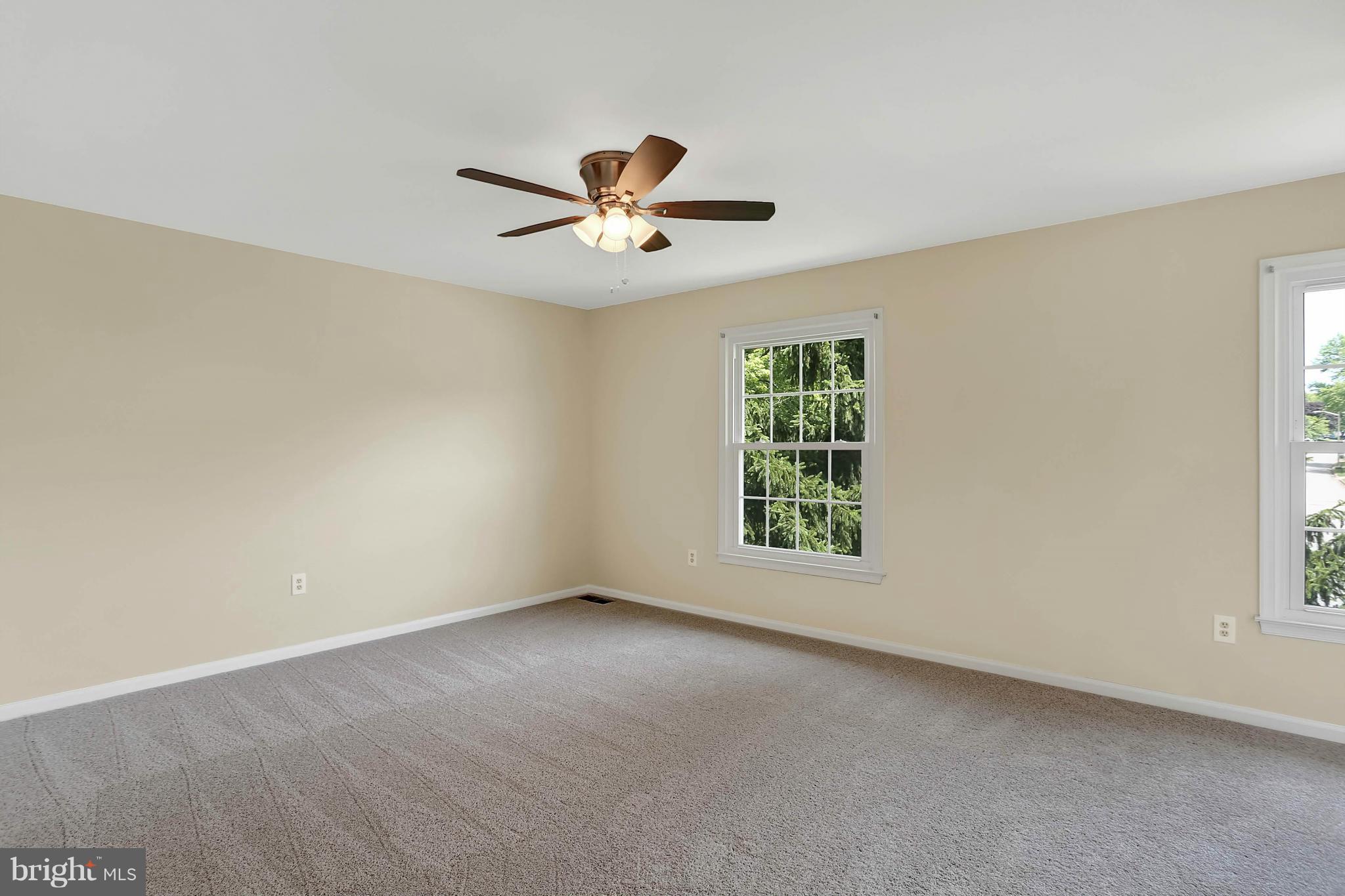 9160 Rockefeller Lane Springfield, VA 22153 - Photo 14 of 27 a view of room with a ceiling fan and window