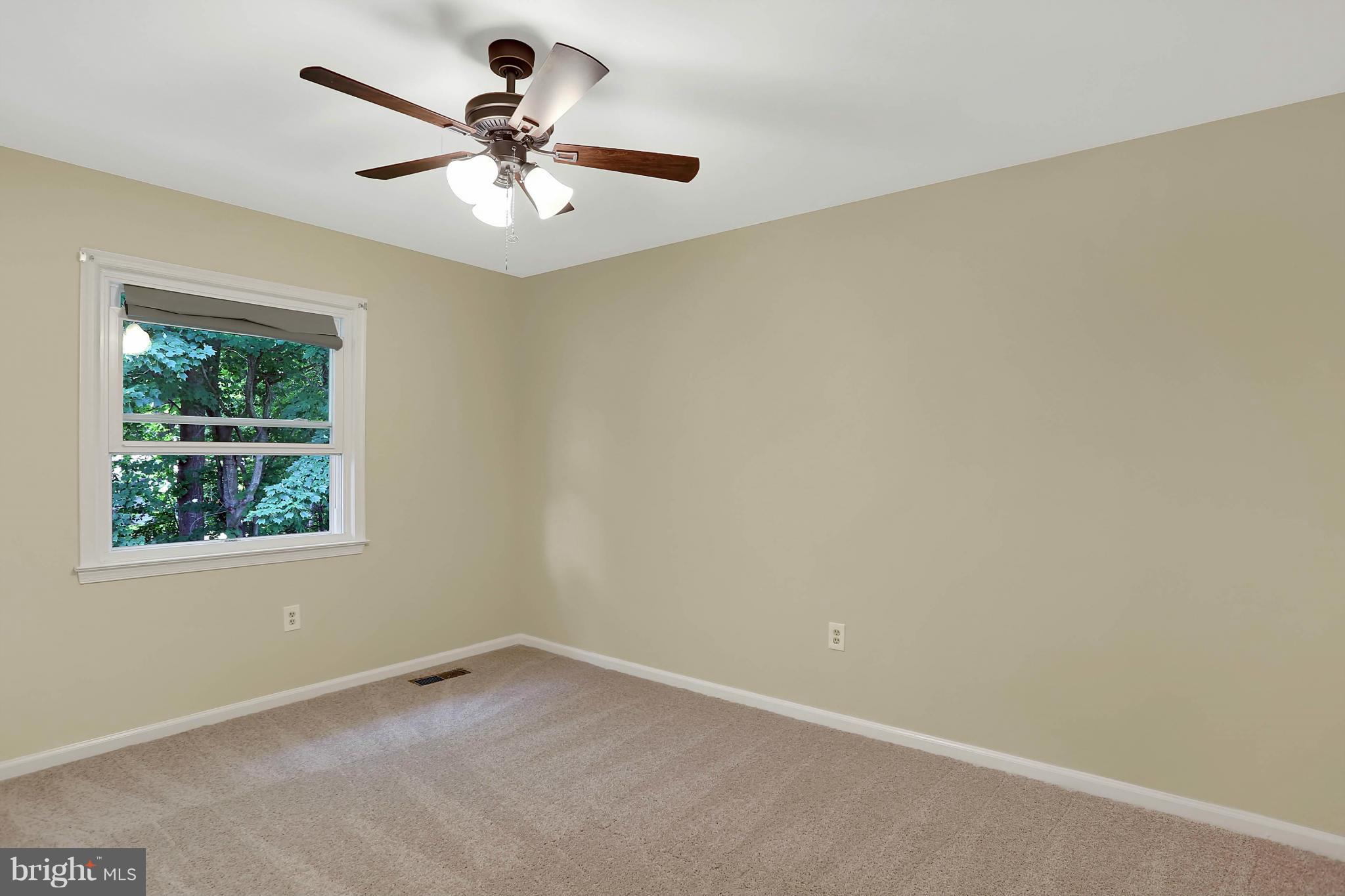 9160 Rockefeller Lane Springfield, VA 22153 - Photo 19 of 27 an empty room with a window
