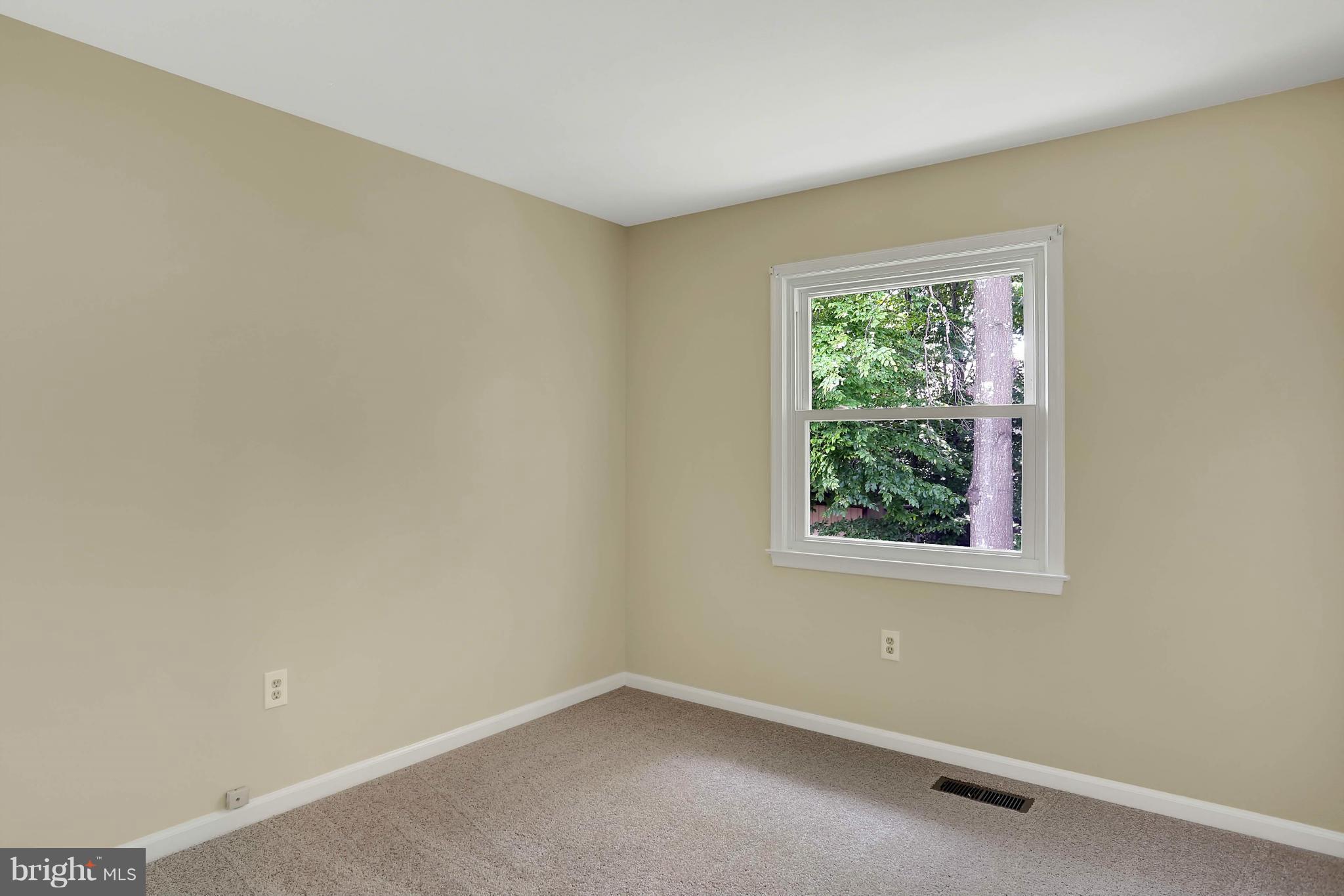 9160 Rockefeller Lane Springfield, VA 22153 - Photo 23 of 27 an empty room with a window