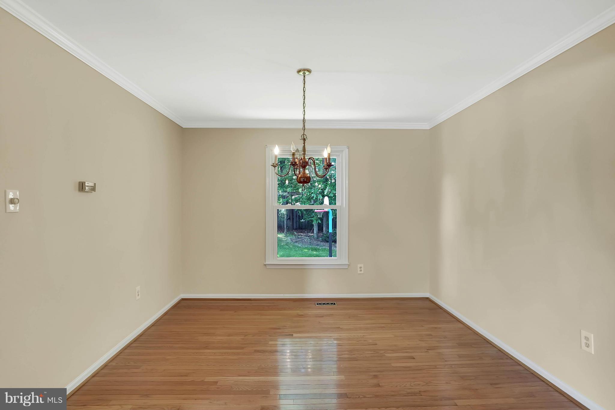9160 Rockefeller Lane Springfield, VA 22153 - Photo 9 of 27 a view of empty room with window and entryway