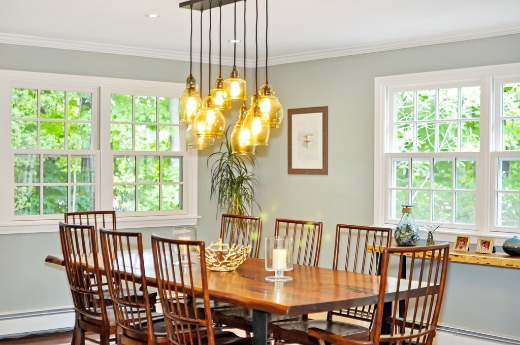 32 Martin Road Concord, MA 01742 - Photo 5 of 17 a view of a dining room with furniture window and outside view