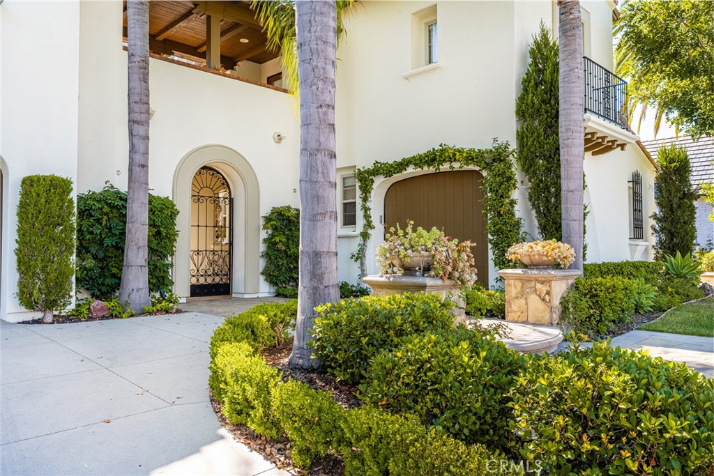 10875 Turnleaf Lane Tustin, CA 92782 - Photo 2 of 15 a front view of a house with garden