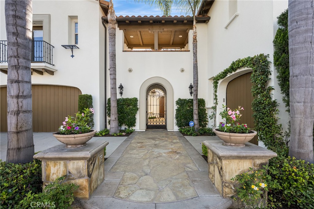 10875 Turnleaf Lane Tustin, CA 92782 - Photo 3 of 15 a front view of a house with a garden