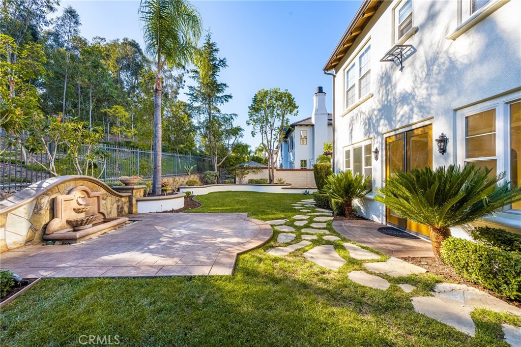 10875 Turnleaf Lane Tustin, CA 92782 - Photo 6 of 15 a view of a garden with a slide