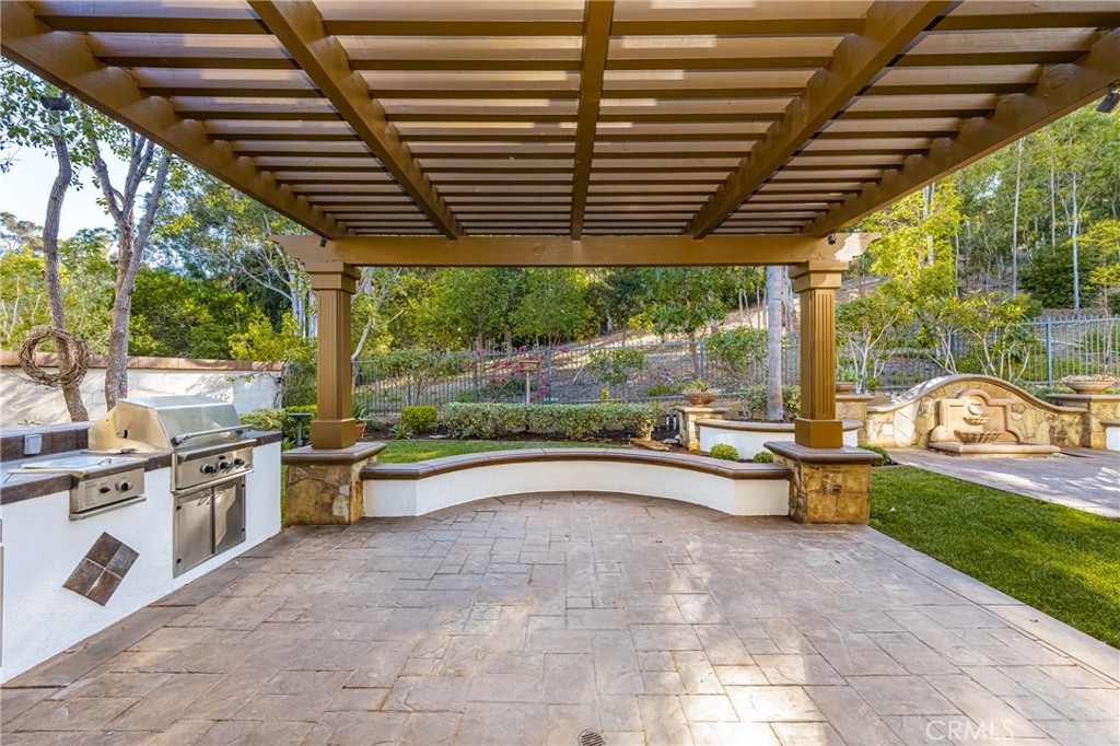 10875 Turnleaf Lane Tustin, CA 92782 - Photo 7 of 15 a view of a patio with a backyard