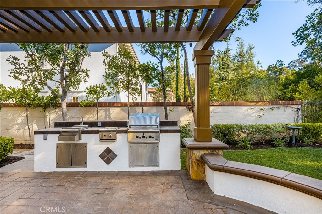 10875 Turnleaf Lane Tustin, CA 92782 - Photo 10 of 15 a view of a porch with furniture and garden