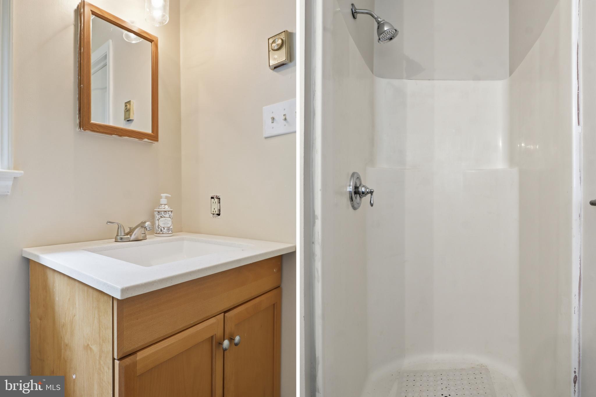 162 Jackson Road Gettysburg, PA 17325 - Photo 22 of 37 a bathroom with a sink a mirror and vanity