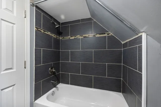 a bathroom with a bathtub