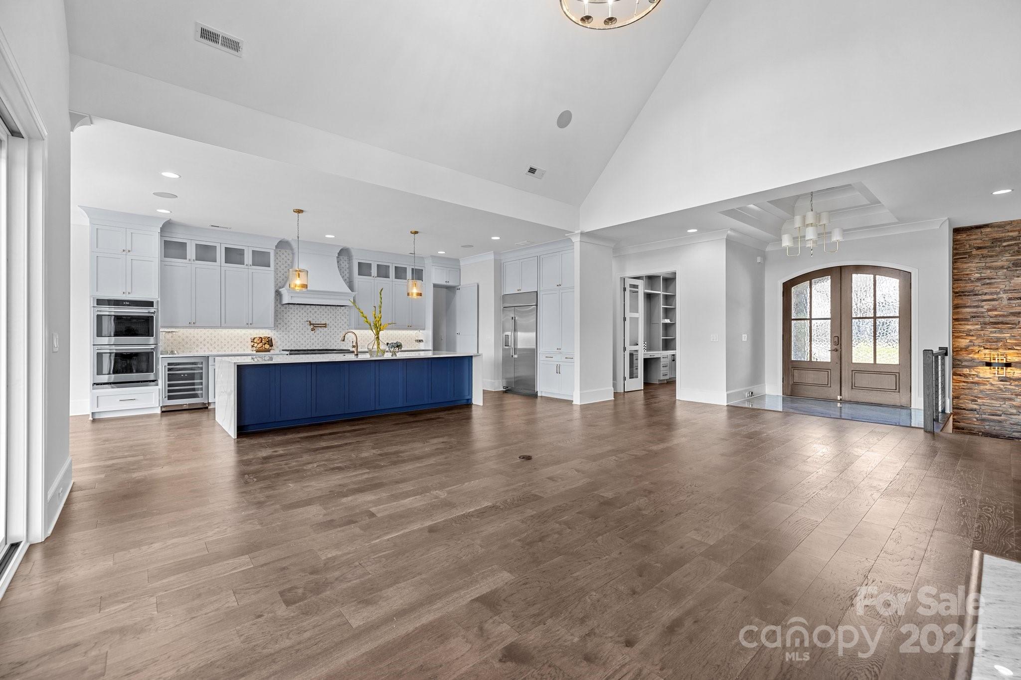 2737 Holbrook Road Fort Mill, SC 29715 - Photo 12 of 46 a view of a living room a kitchen and a sink