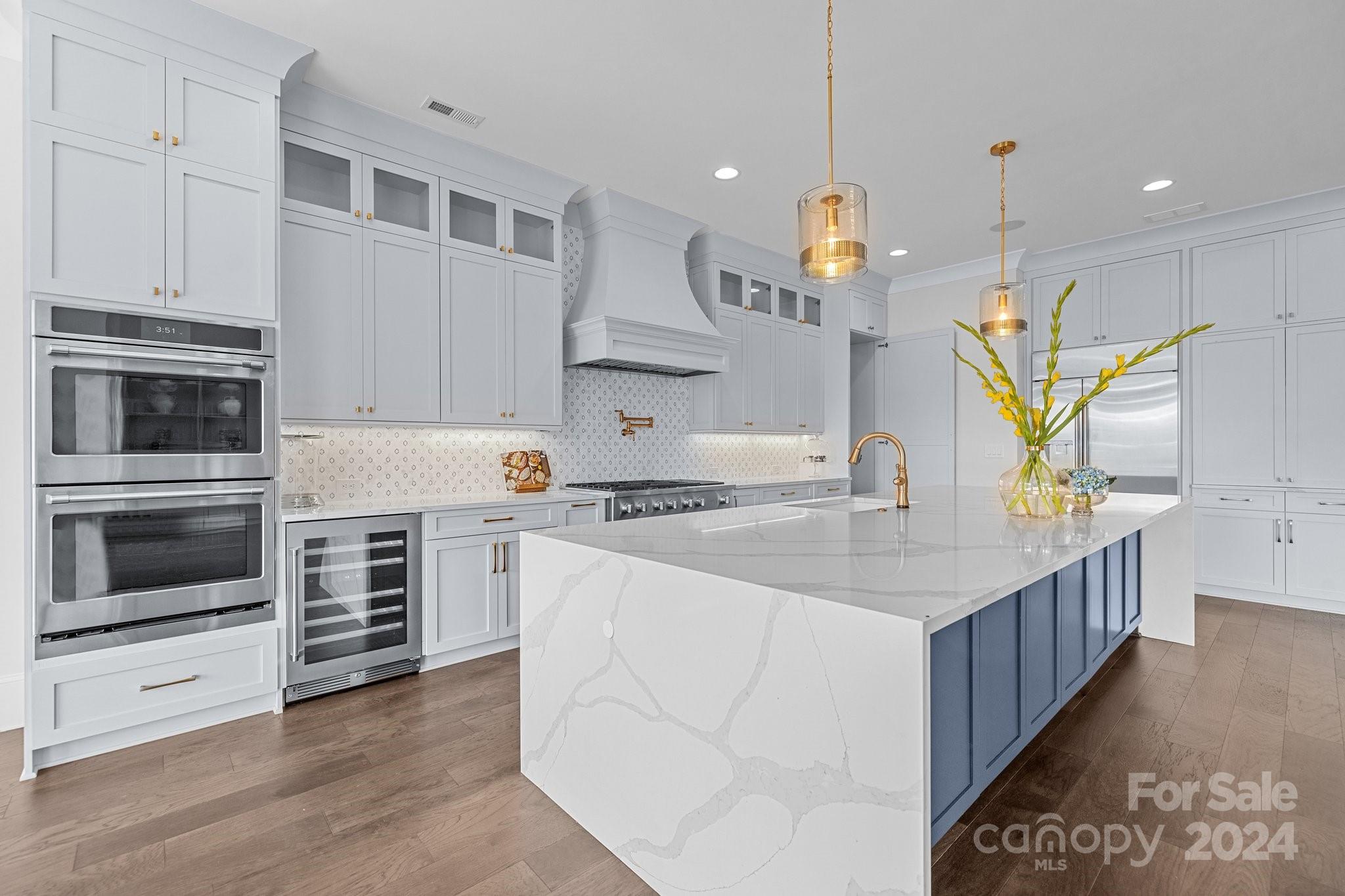 2737 Holbrook Road Fort Mill, SC 29715 - Photo 14 of 46 a kitchen with stainless steel appliances granite countertop a stove and a sink