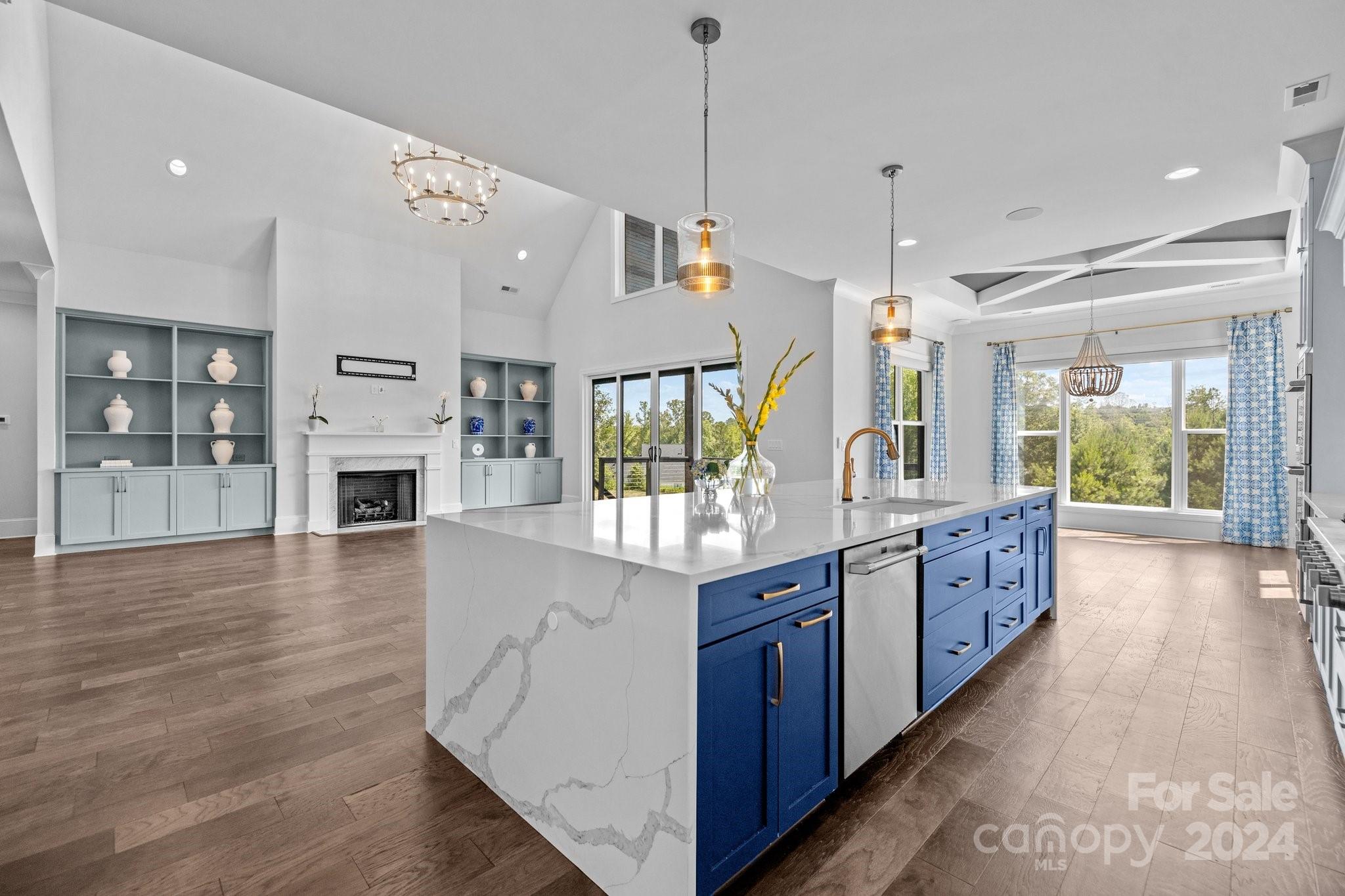 2737 Holbrook Road Fort Mill, SC 29715 - Photo 16 of 46 a large kitchen with stainless steel appliances granite countertop a lot of counter space and wooden floor