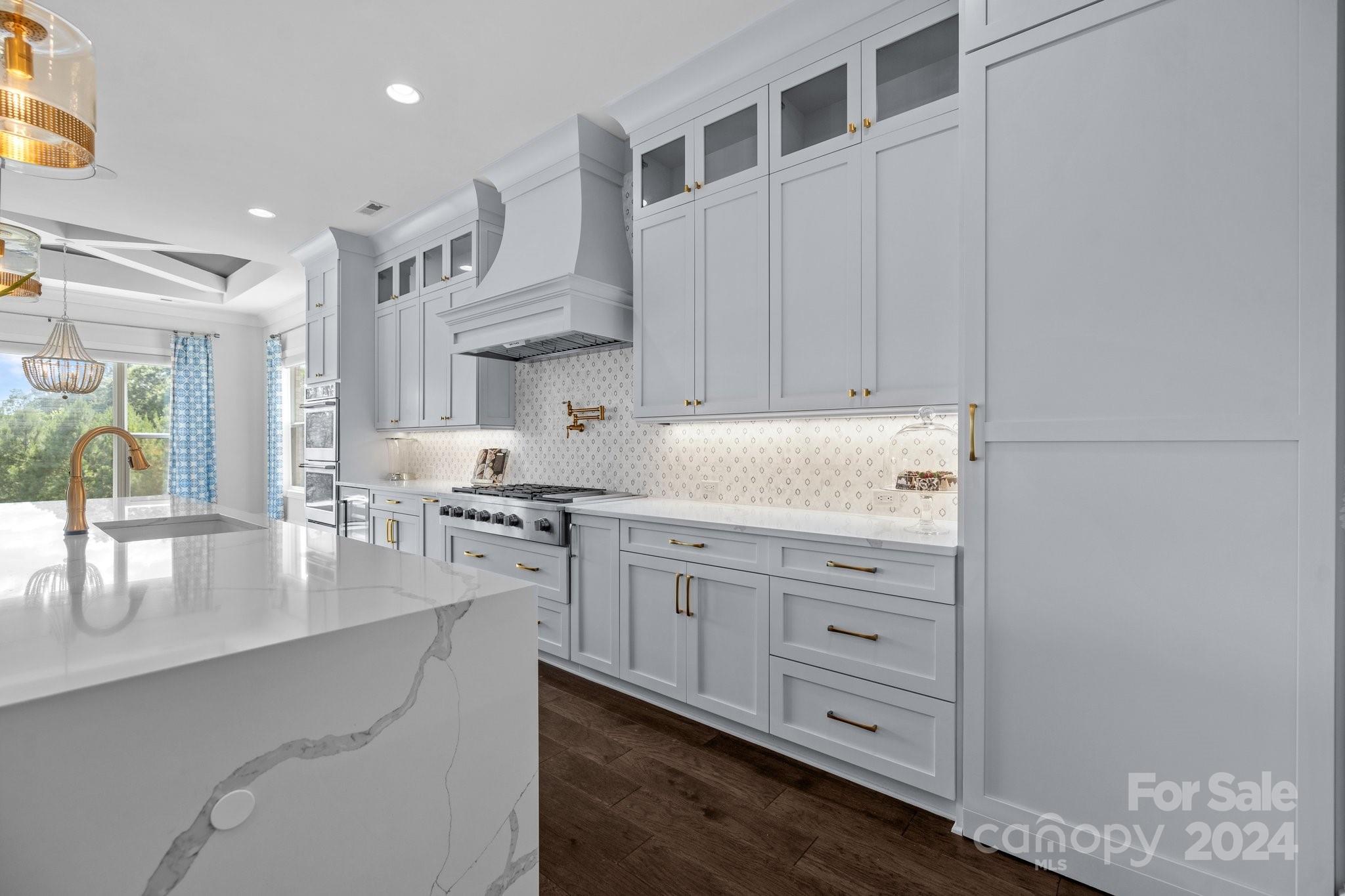 2737 Holbrook Road Fort Mill, SC 29715 - Photo 18 of 46 a kitchen with cabinets appliances and a counter space