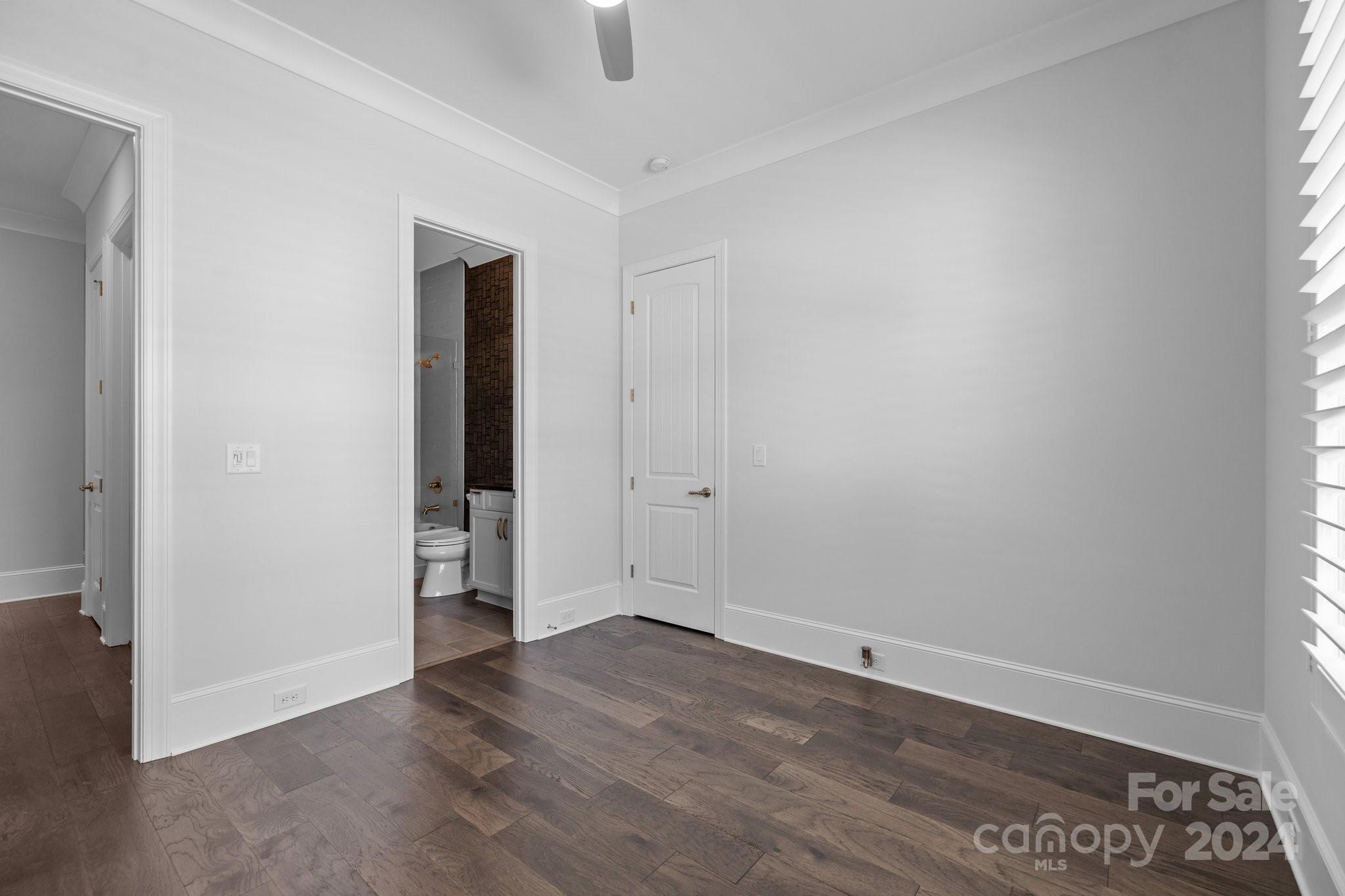 2737 Holbrook Road Fort Mill, SC 29715 - Photo 25 of 46 an empty room with wooden floor and closet