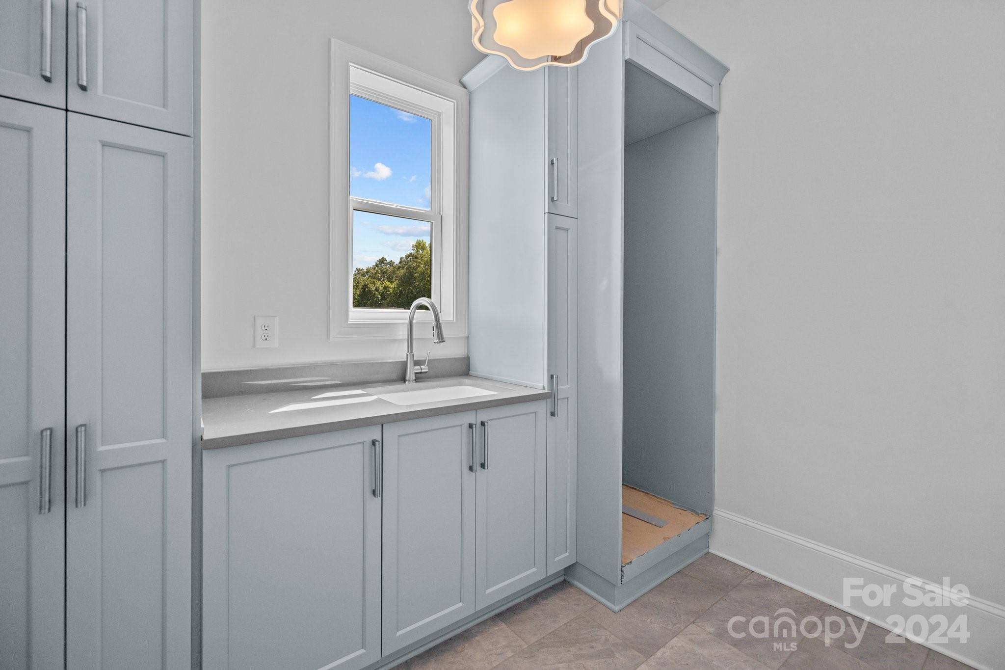 2737 Holbrook Road Fort Mill, SC 29715 - Photo 28 of 46 a bathroom with a sink and a mirror