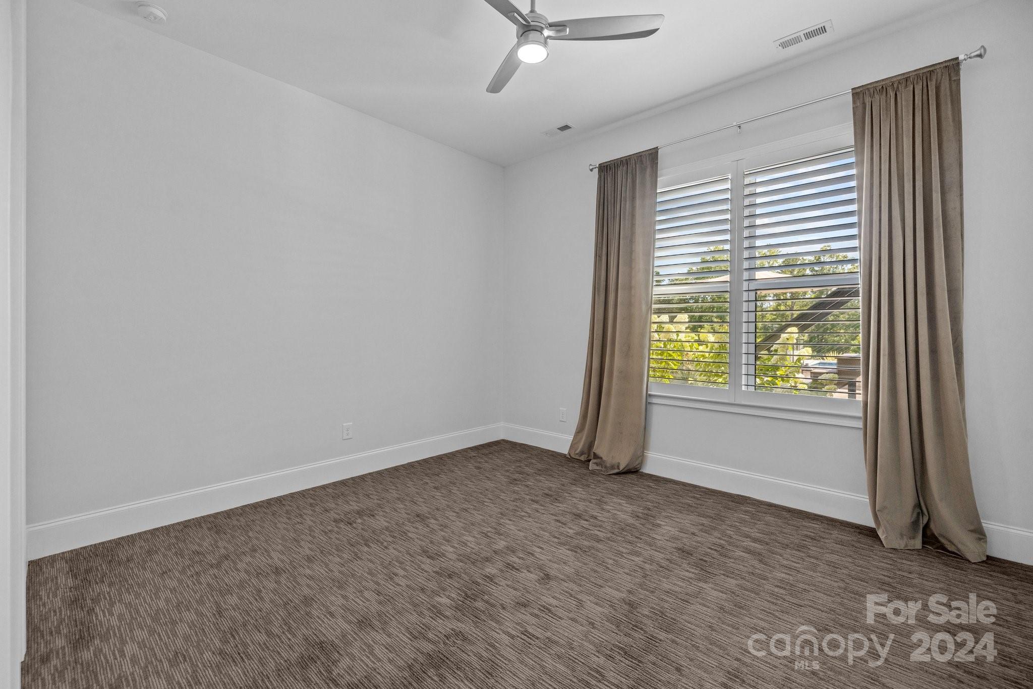 2737 Holbrook Road Fort Mill, SC 29715 - Photo 35 of 46 a view of an empty room with a window