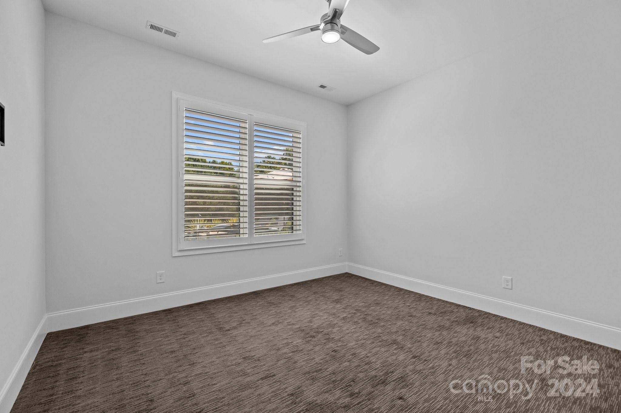 2737 Holbrook Road Fort Mill, SC 29715 - Photo 36 of 46 a view of an empty room with a window