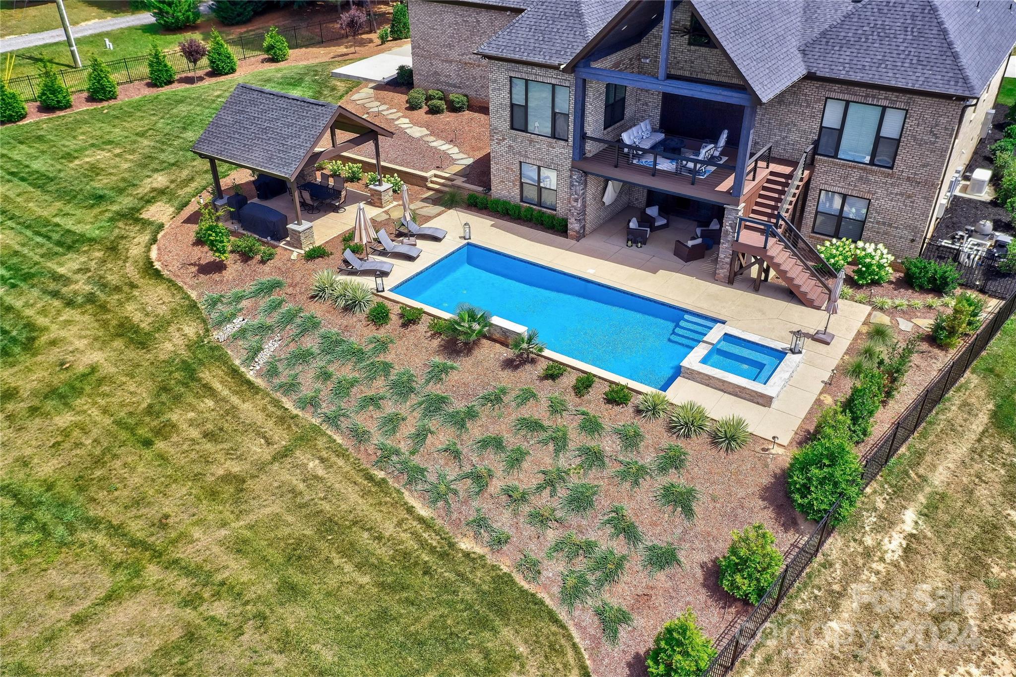 2737 Holbrook Road Fort Mill, SC 29715 - Photo 4 of 46 a view of a house with pool and chairs