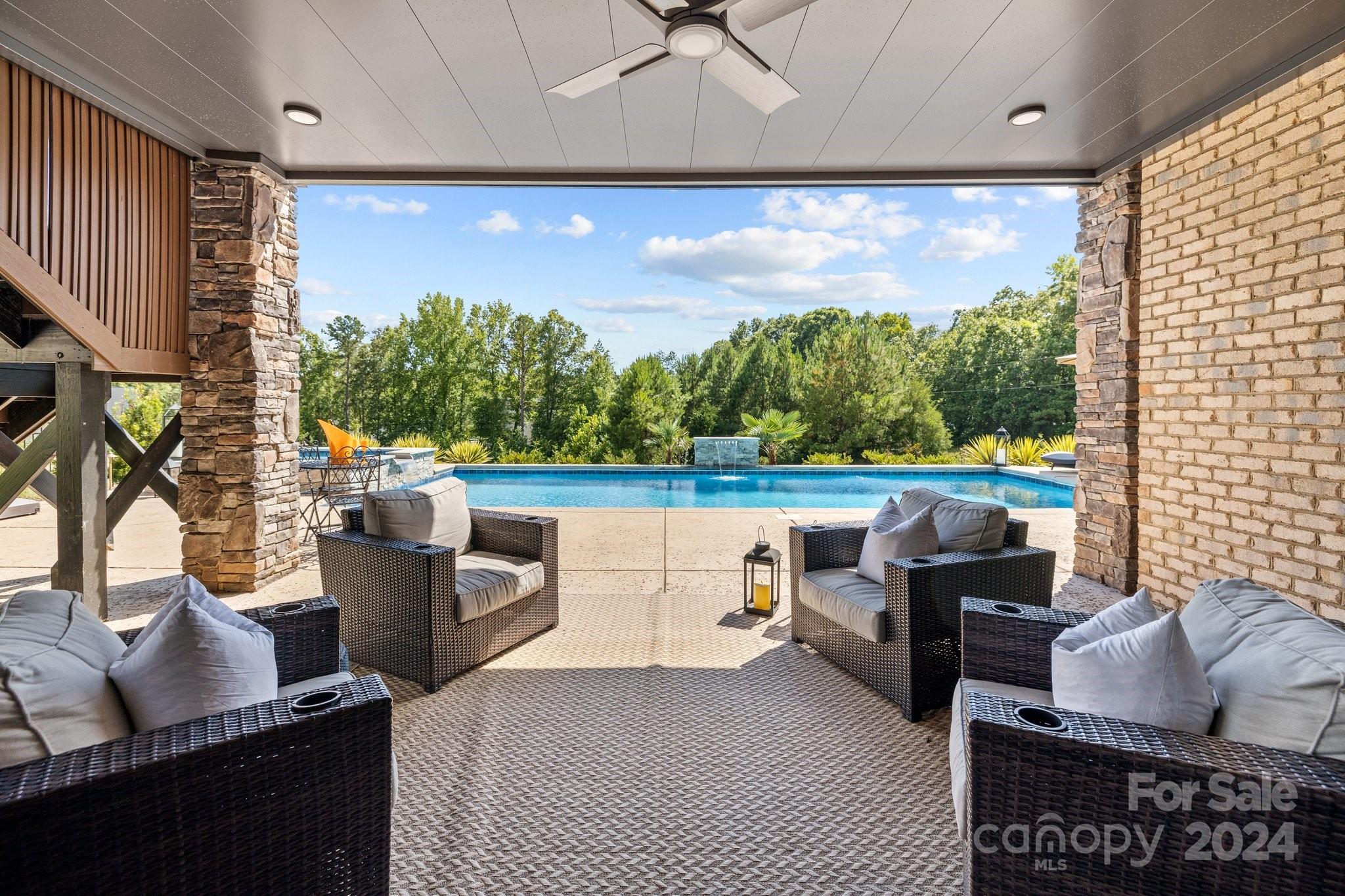 2737 Holbrook Road Fort Mill, SC 29715 - Photo 41 of 46 a living room with patio furniture and a potted plant