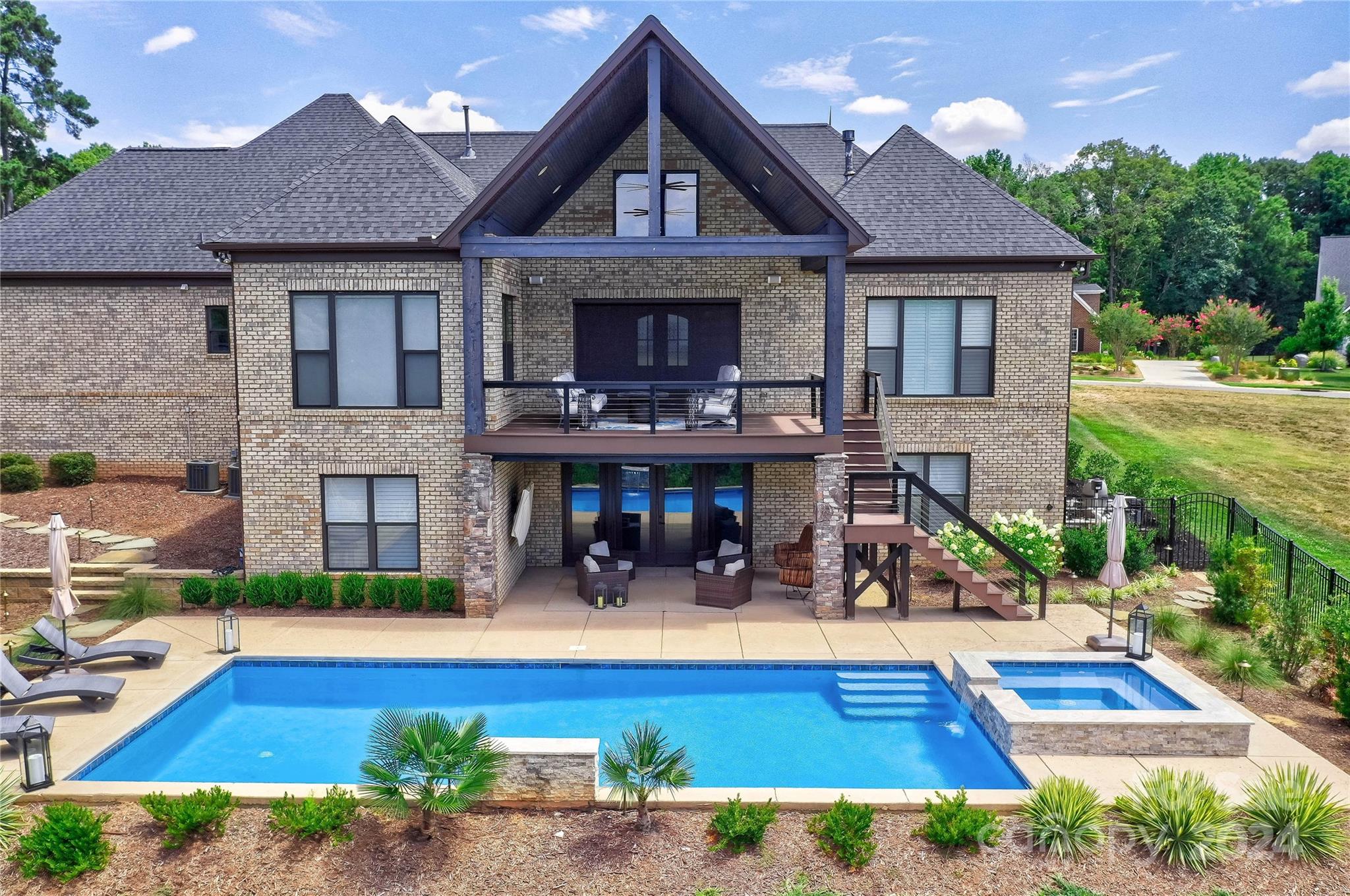 2737 Holbrook Road Fort Mill, SC 29715 - Photo 5 of 46 a view of house with yard outdoor seating and swimming pool