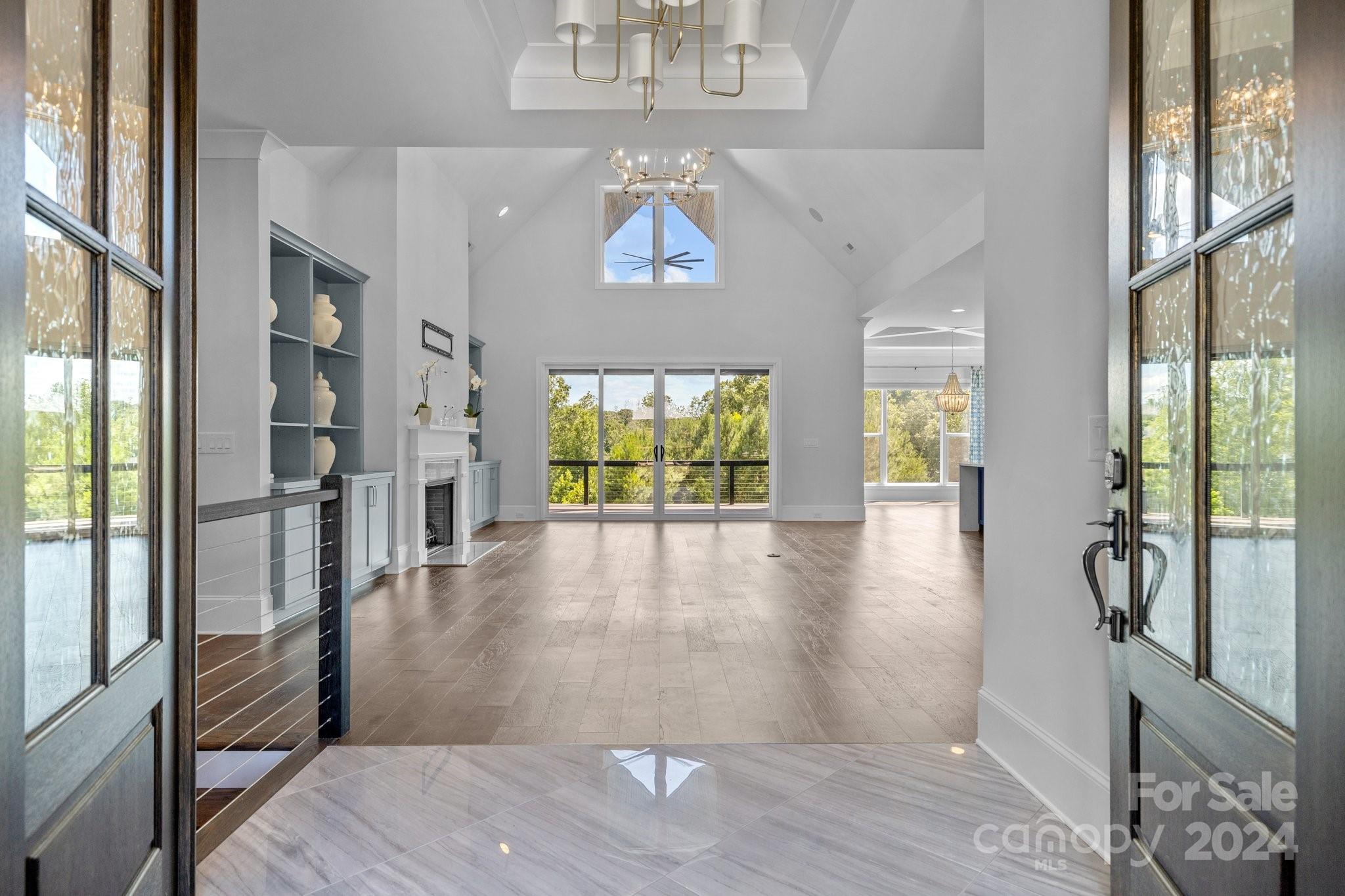 2737 Holbrook Road Fort Mill, SC 29715 - Photo 8 of 46 a view of interior space with wooden floor and windows