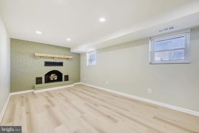 a view of livingroom with a fireplace