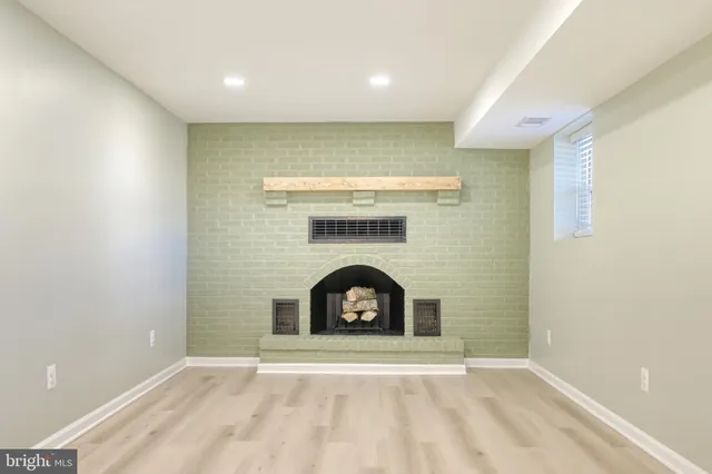 a living room with a fireplace