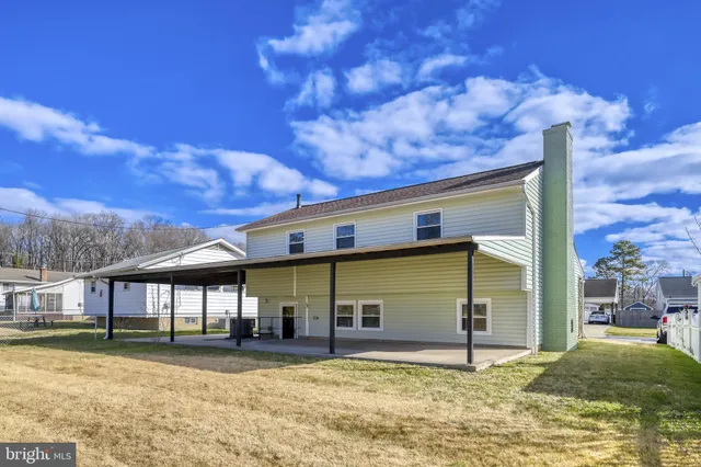 a view of a house with a swimming pool