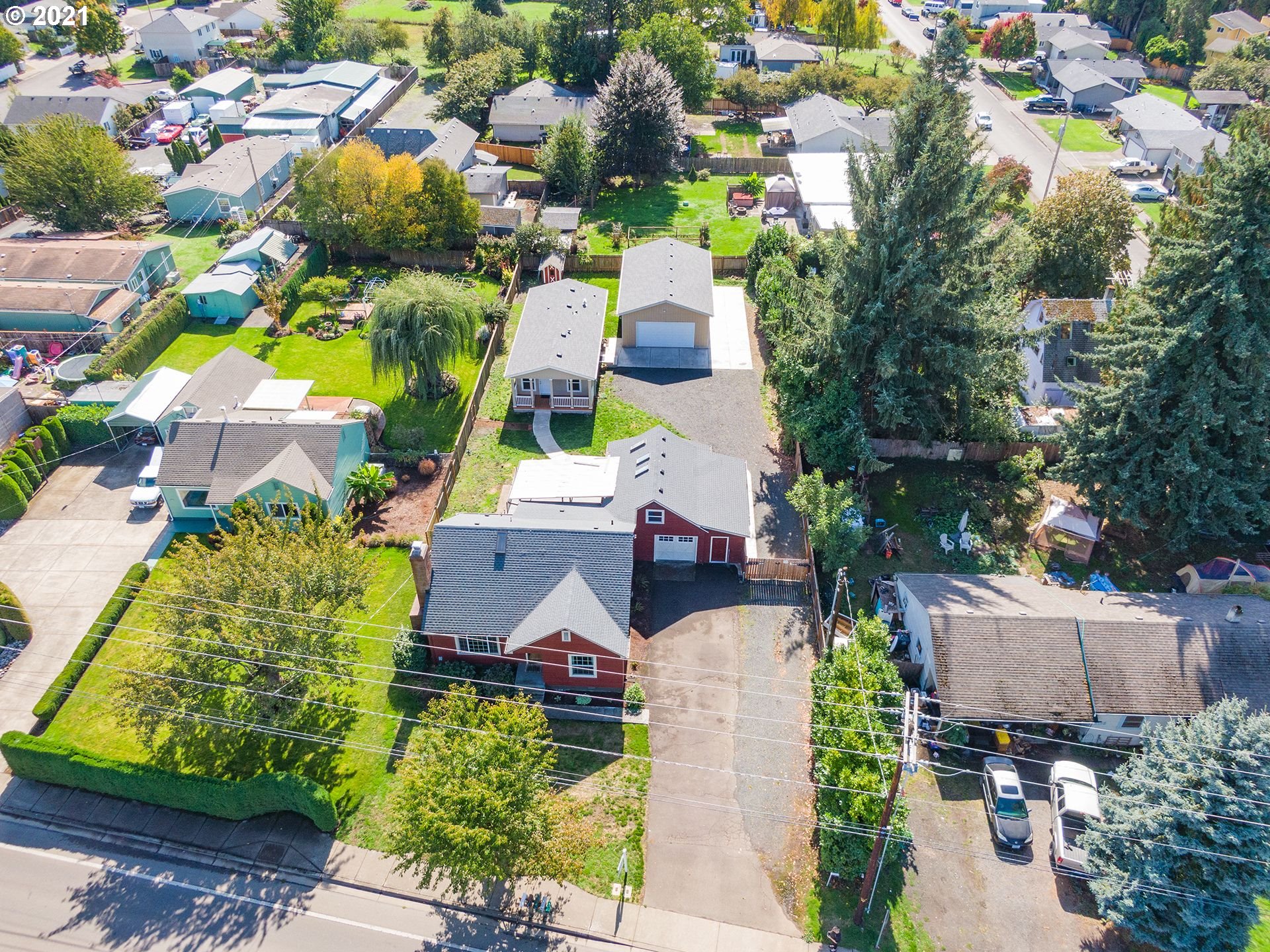 3727 Jasper Road Springfield, OR 97478 - Photo 2 of 32 an aerial view of residential house with outdoor space and swimming pool