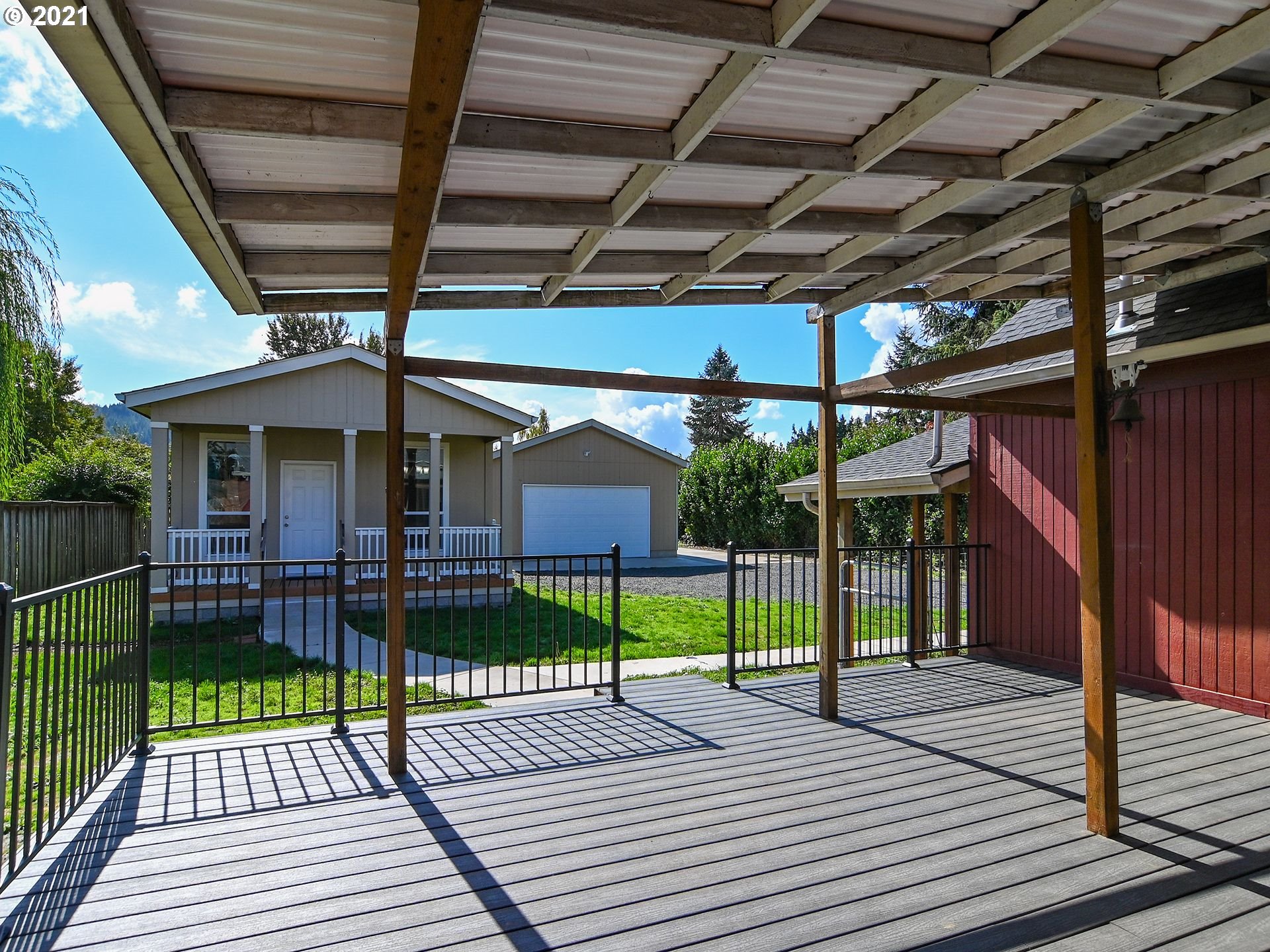 3727 Jasper Road Springfield, OR 97478 - Photo 19 of 32 a view of a house with a porch