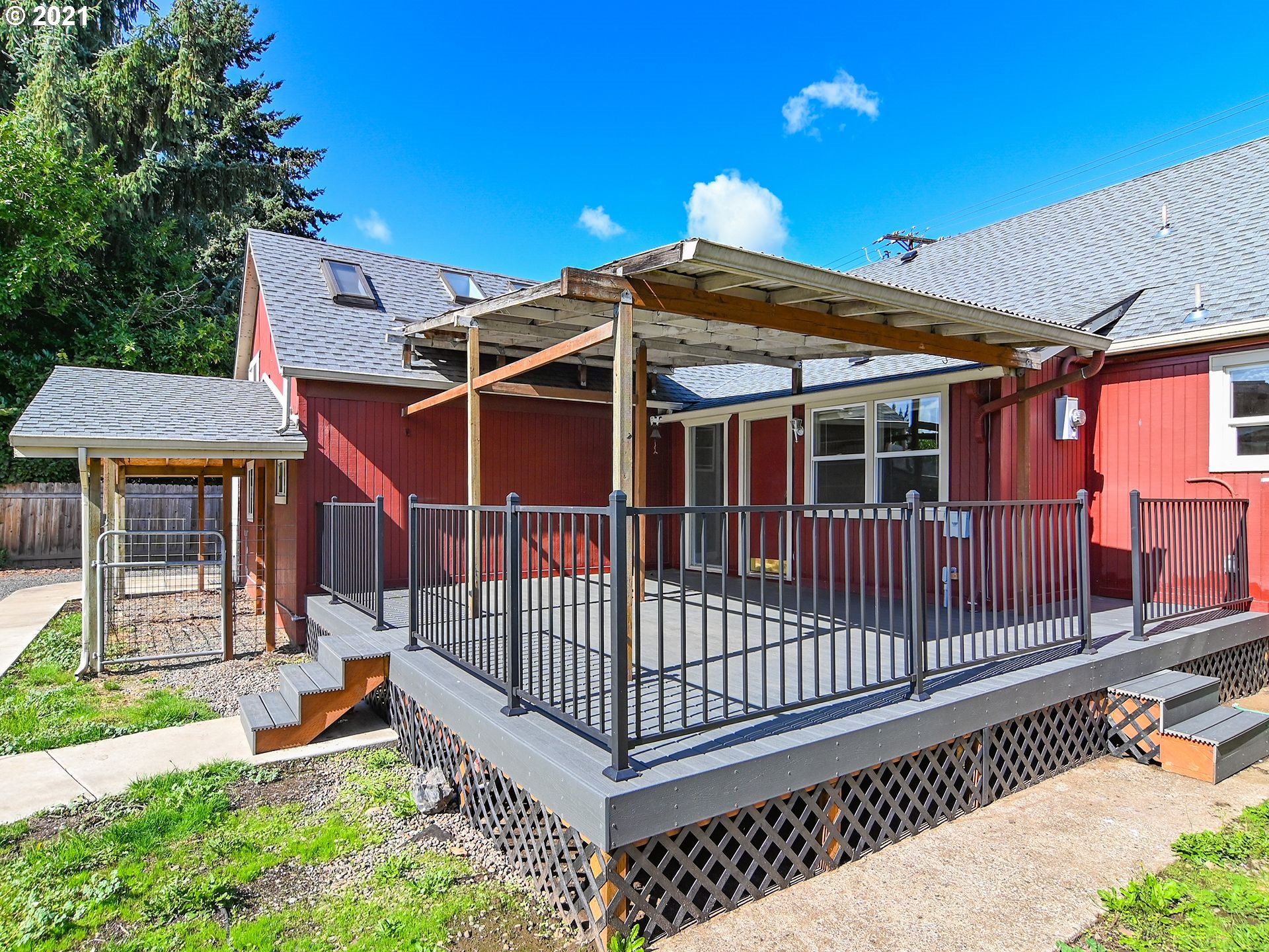 3727 Jasper Road Springfield, OR 97478 - Photo 20 of 32 a view of a roof deck with a small yard and plants