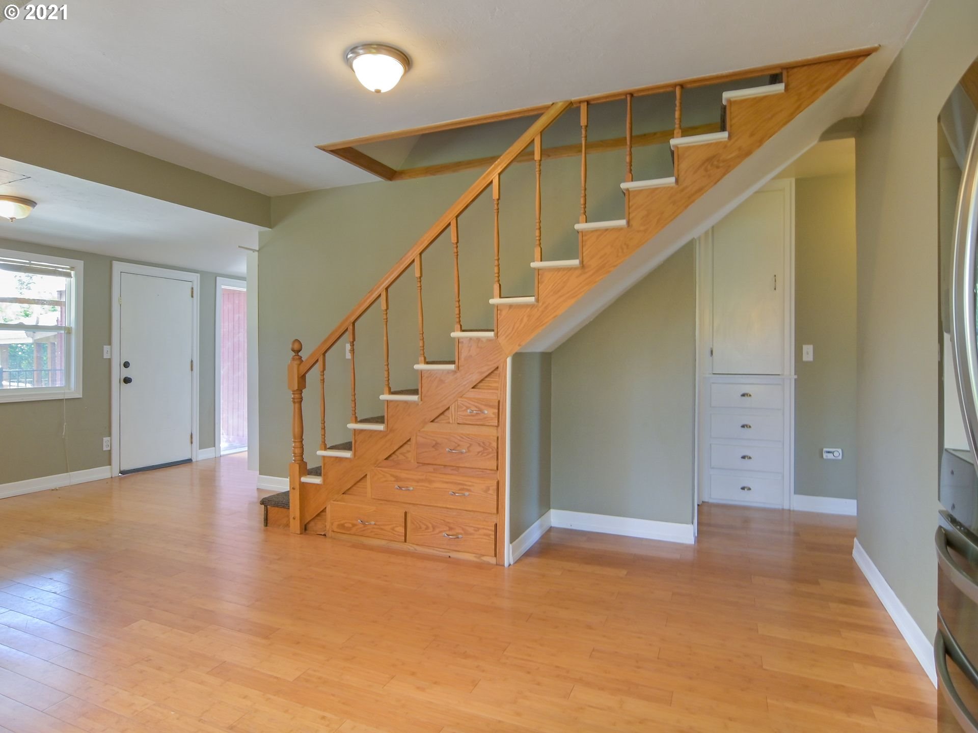3727 Jasper Road Springfield, OR 97478 - Photo 6 of 32 a view of entryway and hall with wooden floor