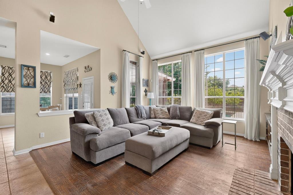 4004 White Porch Road Plano, TX 75024 - Photo 9 of 40 a living room with furniture and a large window